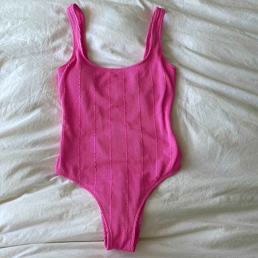 Hot pink rubbed one piece, never worn
